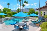 Pool Area Features Multiple Outdoor Dining Options With Mountain Views